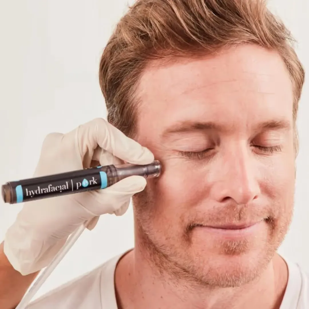 HydraFacial PERK Eye Treatment performed on men's face