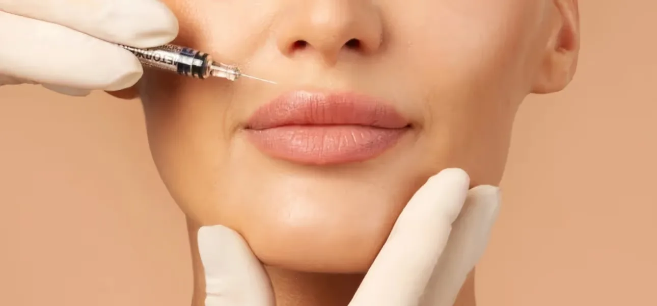 Dermatologist enhance lip plums with fillers