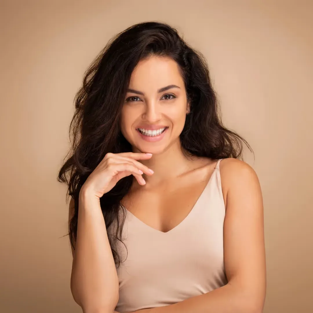 The happy reaction of a girl after seeing a glow from Hydrafacial